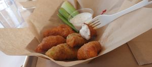 Try 2 of everything 💜 at Saucy Cluckers in Boulder