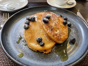 Vegan pancakes with golden syrup and blueberries 🫐  at The Three Horseshoes Hotel in Barnard Castle