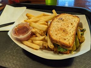 Vegetarian Sandwich with gluten free bread, side of fries and side of salsa at Foodie Club in Grand Canyon Village