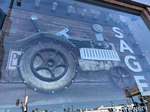 Sign in window at Sage Bistro and KindKreme in Los Angeles