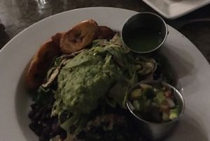 Bowl and avocado burger with potato salad at Sage Bistro and KindKreme in Los Angeles