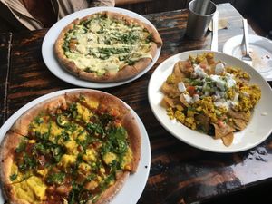 Indian pizza. Heirloom pizza, and chilaquiles!  at Sage Bistro and KindKreme in Los Angeles