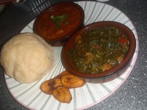 Ugali or Fufu 's Special served with a spicy African tomatoestew , green veggies and plantain.
Also served with okerstew in tomatoes. at Royal Roots Corner in Rotterdam