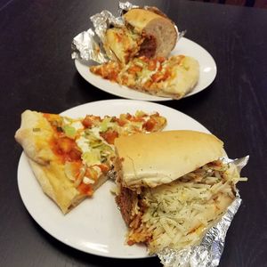 Meatball sub and buffalo chicken pizza at Vegano Italiano - Food Truck in Ann Arbor