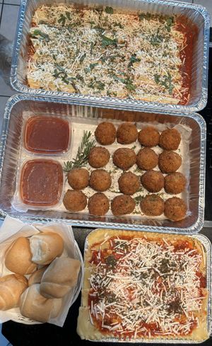 Christmas dinner: Manicotti, Arancini , Lasagna, & breadsticks  at Vegano Italiano - Food Truck in Ann Arbor