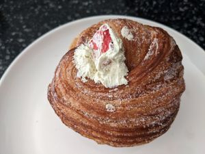 Strawberry pistachio cruffin at Botanical Bakeshop in Milan