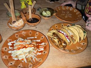 Tacos dorados and an assortment of tacos including the tofu-fish, pastor, potato mushroom, huitlacoche, and more!  at La Vegan Taqueria in Tulum