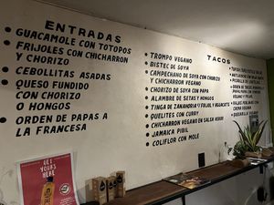 Wall menu en Español  at La Vegan Taqueria in Tulum