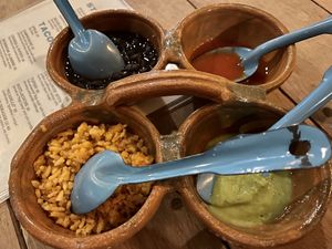 Black bean, Rice, & Salsas. Comes with taco purchase  at La Vegan Taqueria in Tulum