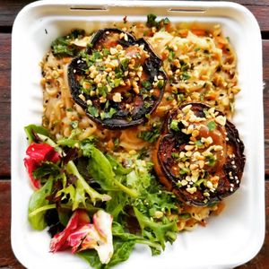 Eggplant steaks over gluten free noodles with peanut sauce at saVor in San Juan