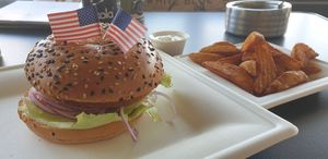 No chicken crunchy burger with wedges and sour cream dip at Tony's Diner in Horn