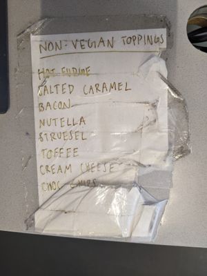 Non-vegan toppings: Hot fudge, salted caramel, bacon, Nutella, streusel,  toffee, cream cheese, chocolate chips at Duck Donuts in Irvine