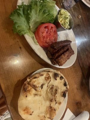 Tempeh TLT but brought not on the sourdough as requested, so i could make my own little wraps with the nan bread they use for the vegan curry.   at BakeChop in Deland