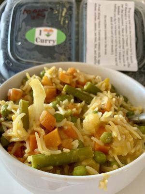 Large portion premade meal from farmers market stand  at I Love Curry in Naples