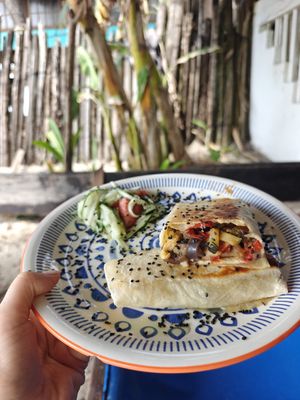 Veg burrito with little side salad at Canto de Caracola in Rincon Del Mar