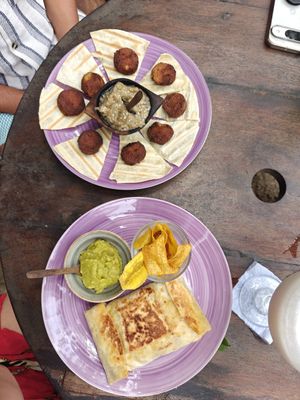 Falafel wrap with avovado and platano chips.
Pita with falafel and eggplant dip at Canto de Caracola in Rincon Del Mar