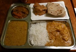 Clockwise from bottom right - masala paneer and rice, dhal, mixed veggie curry, samosa and chapatti. at Dhaba Beas - Vladislavova in Prague