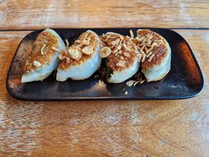 Pan fried spring onion dumplings at Satay in Antwerpen