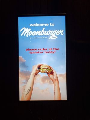 Drive thru welcome screen at Moonburger in Kingston