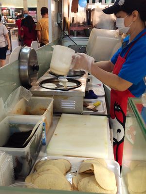 Making pancake at Jollibean - NEX in Northeast Singapore