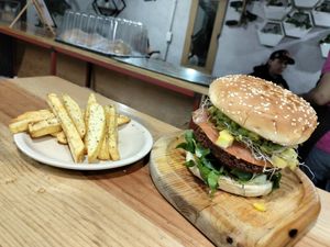 El combo perfecto: hamburguesa hawaiana y papas fritas 🫠 at LunchV - Delivery Only in Mexico City