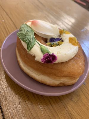 Summer doughnut with edible flowers   at Doe Bakehouse - City Centre in York