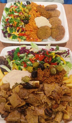 Vegan plate with fries and veganized falafel plate with couscous. You can also choose rice. at MUC - Oliva - T2 in Munich