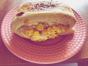 enroladinho of corn and catupiry at Amarama Vegan in Sao Paulo