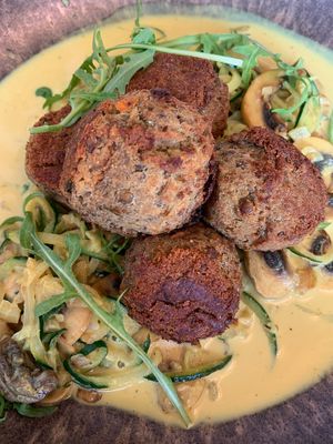 Lentil meatballs with courgette in a coconut sauce   at Caldeiras & Vulcoes in Sao Miguel