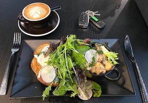Breakfast of braised mushrooms on toast (bread made in-house) with green salad.  Delicious, nutritious food which set me up perfectly for the day's work. Very nice! at Noble Perth in Subiaco