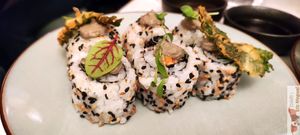 Roasted tofu, sesame shiitake cream, salted leek and carrot, shizo condiment.
Shizo leaf tempura. Lemongrass Teriyaki Sauce at brEAThe Restaurant | Sushi végétal à Paris in Paris