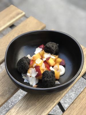 Black sesame cake, lemon cream, peach (weekly menu 18,5€)  at brEAThe Restaurant | Sushi végétal à Paris in Paris