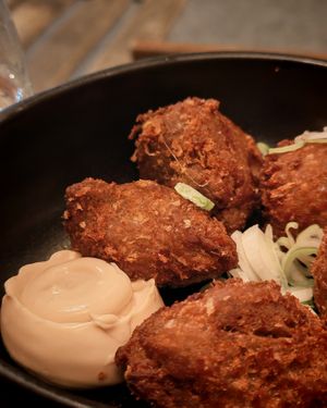 Kimchi stuffing with turnips and tofu, black sesame sauce, mustard pickles at brEAThe Restaurant | Sushi végétal à Paris in Paris