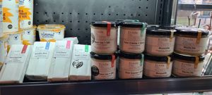 Vegan cheese and yogurt for sale from grocery fridge at Weaver & Wilde Coffee House in Uppermill