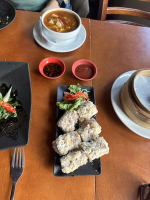 Vegan hot and sour soup and vegetable spring rolls in fried tofu   at LuLu Shanghai Delicacy & Sake Bar in North London