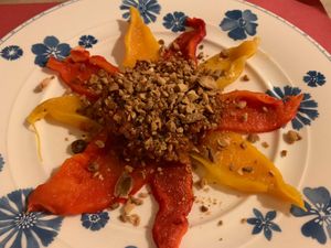 Sundries tomatoes tartare with hazelnuts and oven roasted peppers at L'Angolo Divino in Acqui Terme
