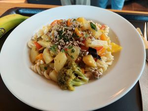 Pasta with summer vegetables in orange-herb sauce & caramelized sunflower seeds; free banana (9.90) at Paradieschen in Linsengericht