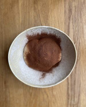 Mushroom tiramisu. Porcini sponge soaked with almond liquor, layers of coffee caramel and cocoa nibs. Lashing of mascarpone foam topped with cocoa and cep powder. All vegan! 🌱 at Table 13 in Wheatley