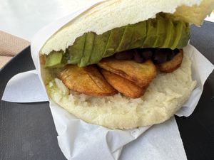 Arepa with black beans avocado and plantain   at Avanti in Boulder