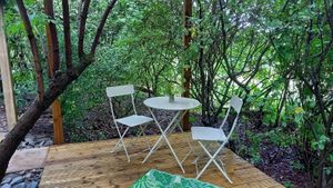 Dining on the deck at Esk Yurt in Peebles