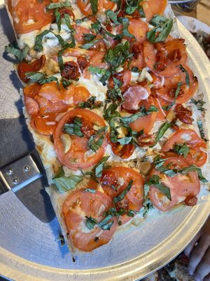 The margarita vegan Chicago style pie  at TNT Pizza in San Diego