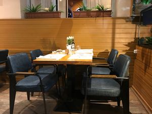 Indoor seating at The Rooms Restaurant in Tirana