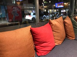 Cozy indoor seating at The Rooms Restaurant in Tirana