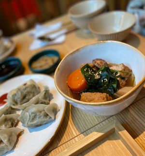 Dumplings and braised tofu with veggies at Peace Beast in Hong Kong Island