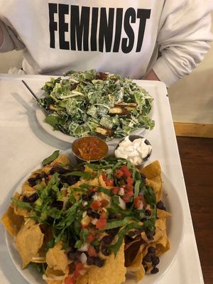 Nachos and Caesar salad - with a side of feminism! at The Owlery in Bloomington