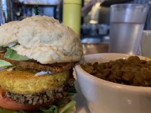 Loaded vegan breakfast sandwich + curried lentils! at The Owlery in Bloomington