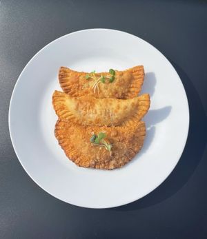 Hot Pocket Pizza Empanada, Beefless Meat Empanada, Guava & Cheese Empanada  at Healthy As A Motha Vegan Kitchen in Brooklyn