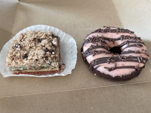 rainbow cookie with crumb topping and chocolate donut with strawberry icing   at Pride Enjoy in Wading River
