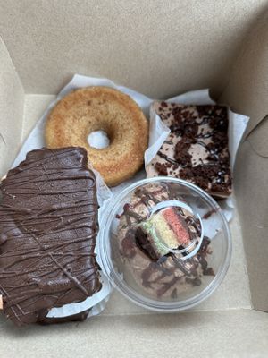 Apple cider donut, brownie cheesecake bar, rainbow cookie mousse bar, and chocolate mousse  at Pride Enjoy in Wading River