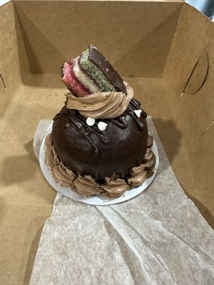 Small rainbow cookie cannoli cake  at Pride Enjoy in Wading River